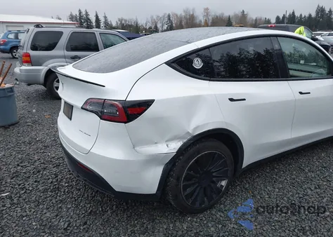 2023 Tesla Model Y Awd/Long Range Dual Motor All-Wheel Drive from USA, damaged, VIN 7SAYGDEE0PF674674